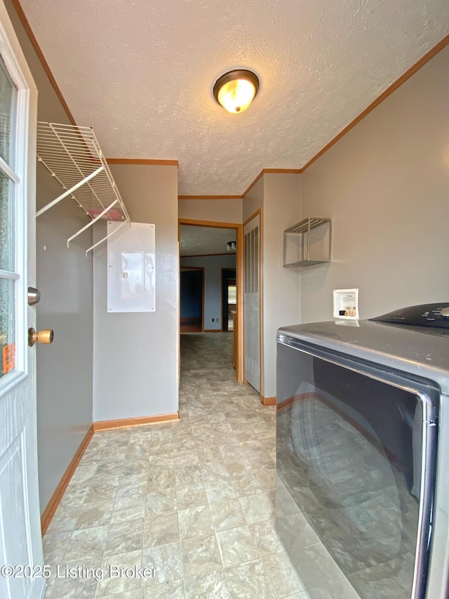 356 Armes Lively Rd, Leitchfield, KY 42754 - washroom featuring ornamental molding, a textured ceiling, and washer and dryer