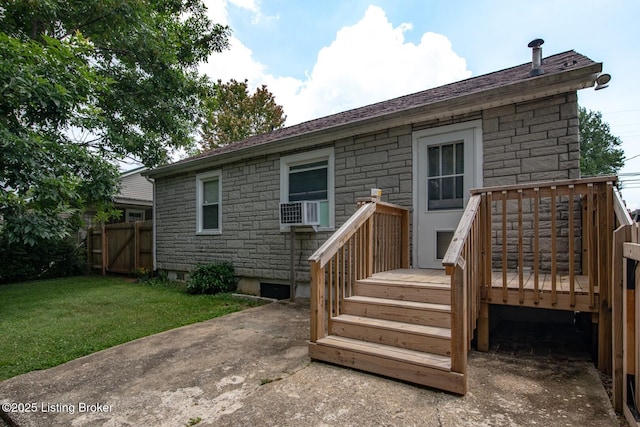 218 N Mantle Ave, Elizabethtown, KY 42701 - back of house featuring stone siding, a wooden deck, and cooling unit