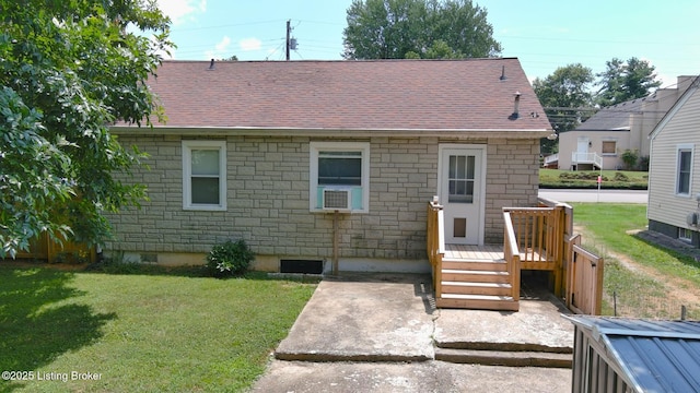 218 N Mantle Ave, Elizabethtown, KY 42701 - rear view of house with a yard, stone siding, roof with shingles, and cooling unit