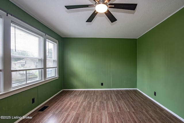 218 N Mantle Ave, Elizabethtown, KY 42701 - spare room featuring wood finished floors, a textured ceiling, and ceiling fan
