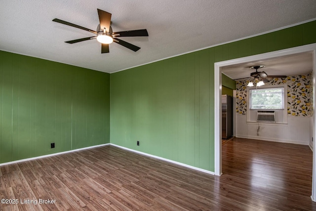 218 N Mantle Ave, Elizabethtown, KY 42701 - spare room featuring a ceiling fan, wood finished floors, a textured ceiling, and cooling unit