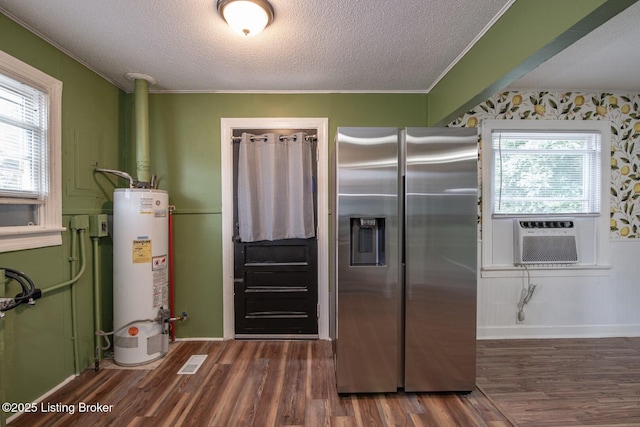 218 N Mantle Ave, Elizabethtown, KY 42701 - kitchen with stainless steel refrigerator with ice dispenser, water heater, green cabinetry, dark wood-style flooring, and a textured ceiling