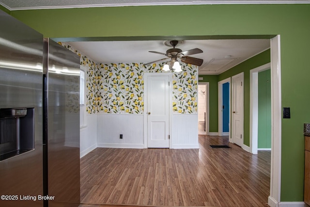 218 N Mantle Ave, Elizabethtown, KY 42701 - unfurnished room with wood finished floors, a ceiling fan, and a wainscoted wall