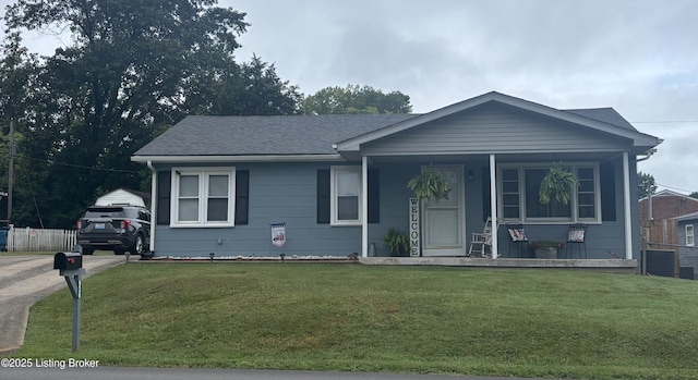 936 Old Ekron Rd, Brandenburg, KY 40108 - view of front facade featuring a porch, a front lawn, and roof with shingles