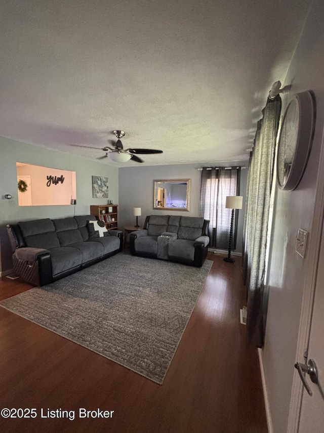 936 Old Ekron Rd, Brandenburg, KY 40108 - living area with dark wood-style floors and a ceiling fan