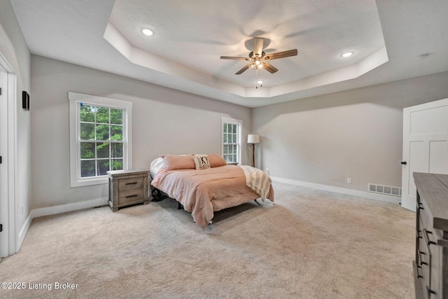 90 Glenn Eagle Rd, Brandenburg, KY 40108 - bedroom featuring a tray ceiling, light colored carpet, recessed lighting, and a ceiling fan
