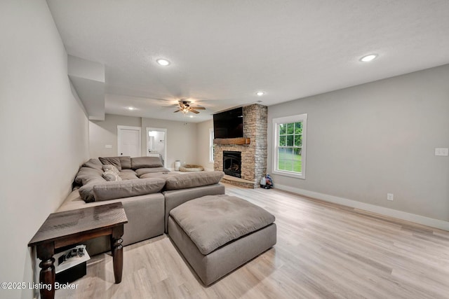 90 Glenn Eagle Rd, Brandenburg, KY 40108 - living area featuring ceiling fan, light wood-style flooring, a stone fireplace, and recessed lighting