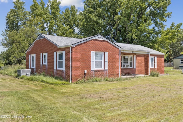 2904 State Route 58 E, Mayfield, KY 42066 - view of front of house featuring brick siding, a front yard, and roof with shingles