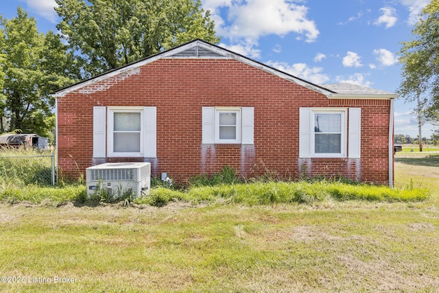 2904 State Route 58 E, Mayfield, KY 42066 - view of side of home featuring brick siding and a lawn