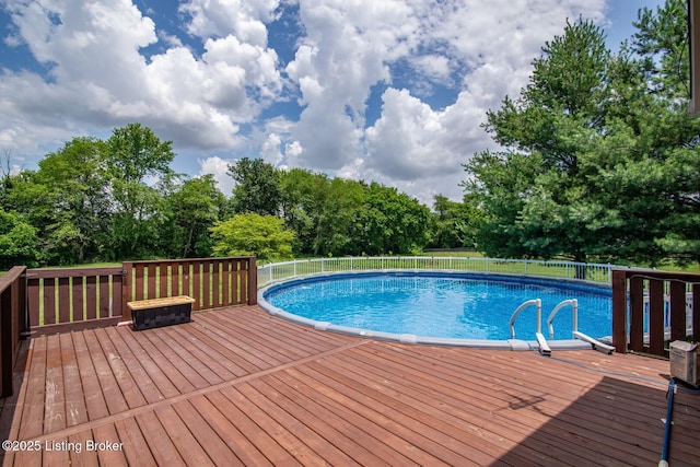 515 Clymene Rd, Cecilia, KY 42724 - view of pool featuring a wooden deck and view of scattered trees