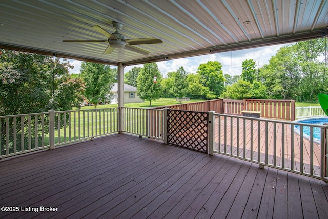 515 Clymene Rd, Cecilia, KY 42724 - deck featuring a ceiling fan and view of wooded area