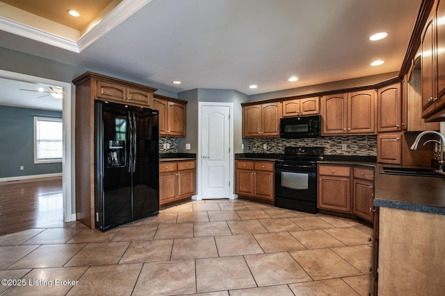 515 Clymene Rd, Cecilia, KY 42724 - kitchen with black appliances, dark countertops, backsplash, recessed lighting, and ceiling fan