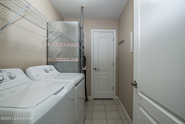 515 Clymene Rd, Cecilia, KY 42724 - laundry area featuring washer and clothes dryer and light tile patterned flooring