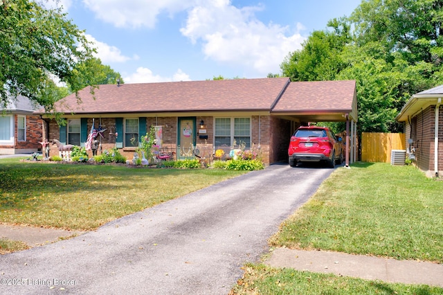 3308 Mcadams Ct, Jeffersontown, KY 40299 - ranch-style home featuring driveway, an attached carport, roof with shingles, and brick siding