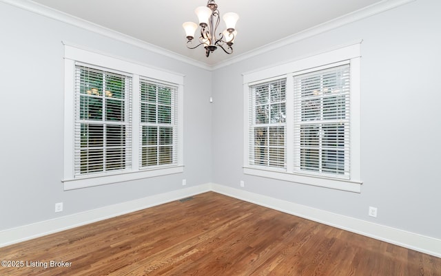 9403 Delphinium St Unit 101, Prospect, KY 40059 - unfurnished room with a chandelier, healthy amount of natural light, crown molding, and wood finished floors