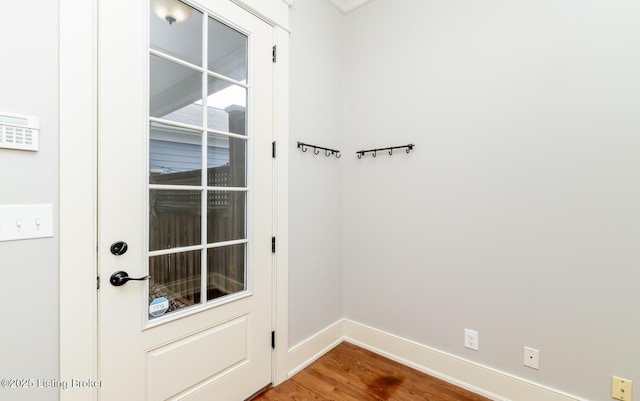 9403 Delphinium St Unit 101, Prospect, KY 40059 - doorway featuring baseboards and wood finished floors