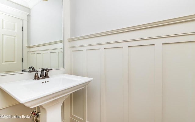 9403 Delphinium St Unit 101, Prospect, KY 40059 - bathroom featuring a decorative wall and wainscoting