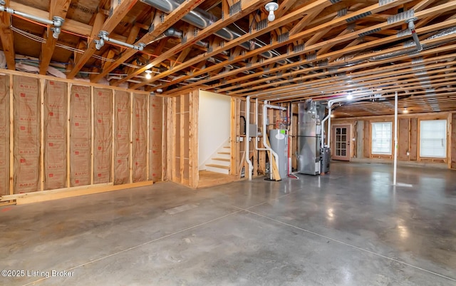9403 Delphinium St Unit 101, Prospect, KY 40059 - below grade area with heating unit, stairs, and water heater