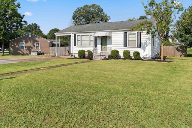  - ranch-style home featuring roof with shingles