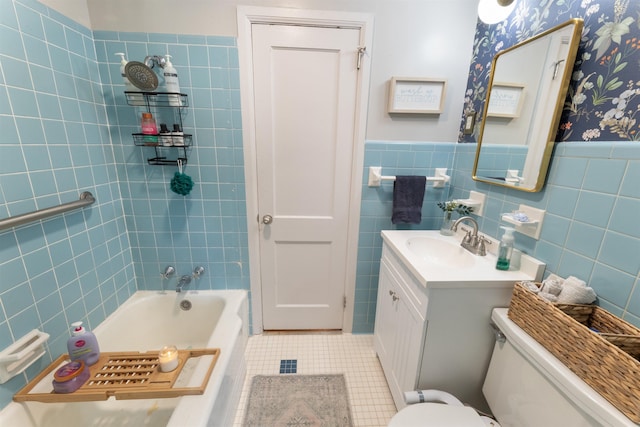  - full bath with vanity, tile walls, a wainscoted wall, tile patterned floors, and wallpapered walls