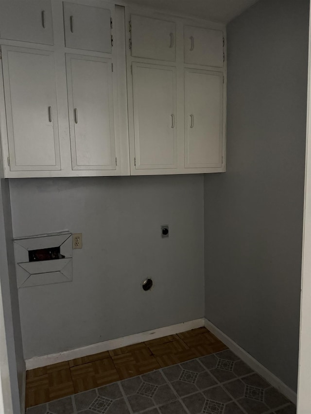  - laundry area featuring cabinet space and electric dryer hookup
