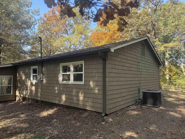 view of home's exterior featuring central air condition unit