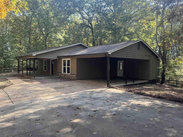 view of front facade with a carport