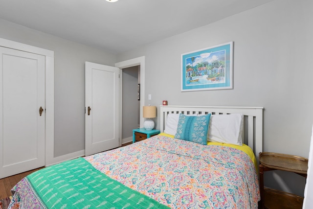 bedroom featuring wood-type flooring