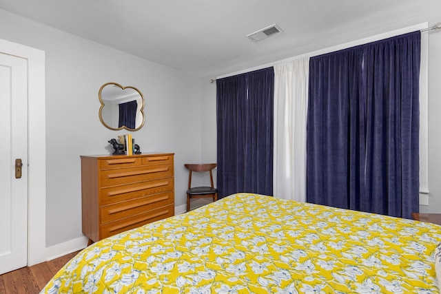 bedroom featuring hardwood / wood-style flooring