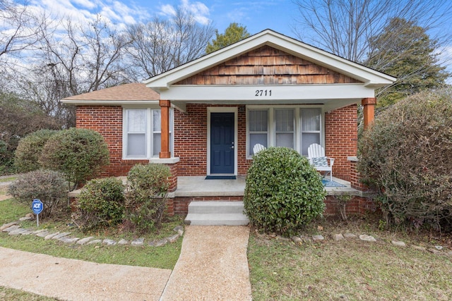 bungalow featuring covered porch