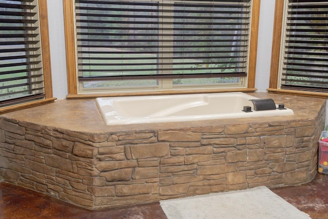 4940 Kent Rd, Tremont, MS 38876 - bathroom featuring a wealth of natural light and tiled bath