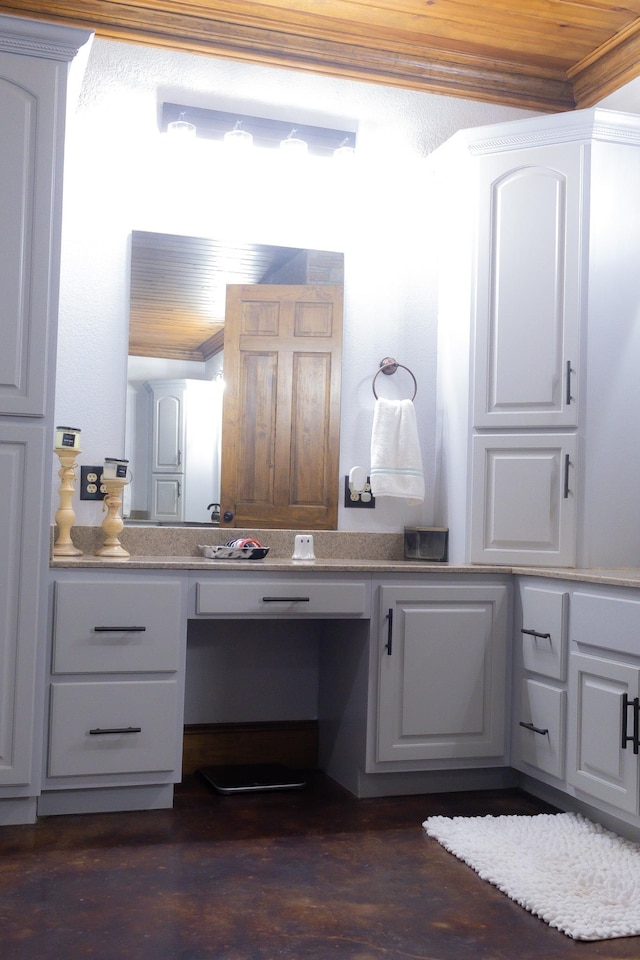 4940 Kent Rd, Tremont, MS 38876 - bathroom featuring hardwood / wood-style flooring, vanity, and crown molding