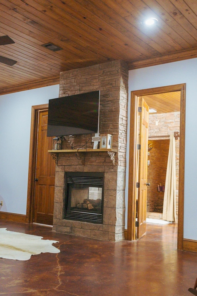 4940 Kent Rd, Tremont, MS 38876 - unfurnished living room with wood-type flooring, wooden ceiling, a stone fireplace, and crown molding