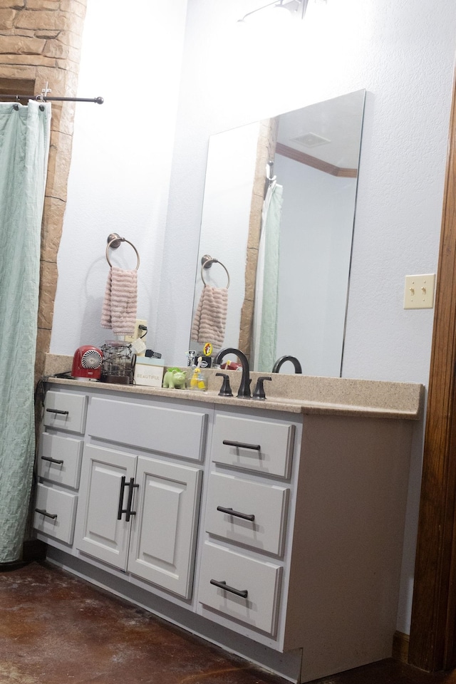 4940 Kent Rd, Tremont, MS 38876 - bathroom with vanity and concrete flooring