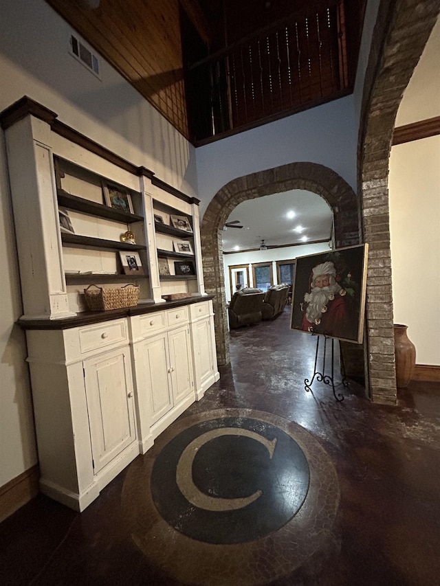 4940 Kent Rd, Tremont, MS 38876 - bar featuring white cabinetry and ceiling fan