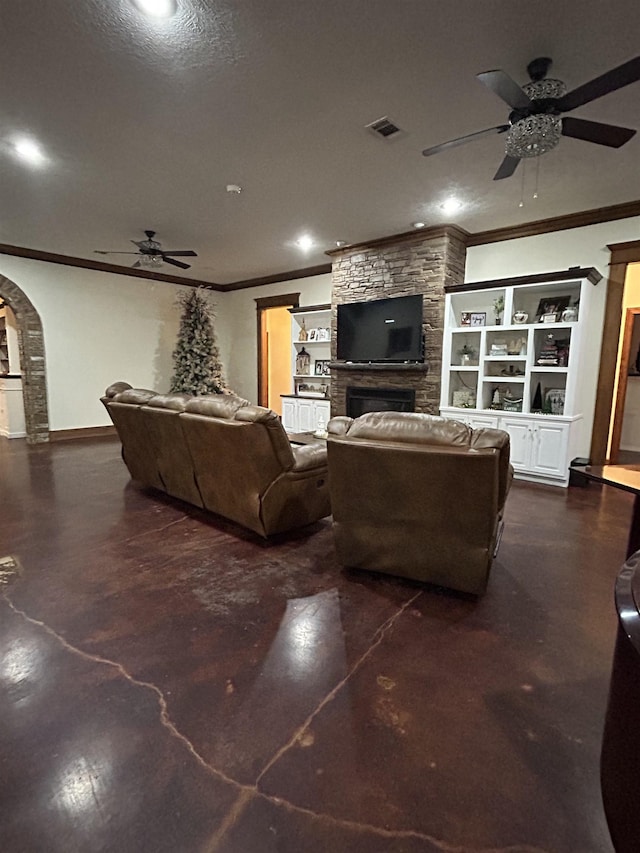 4940 Kent Rd, Tremont, MS 38876 - living room with a stone fireplace, crown molding, and a textured ceiling