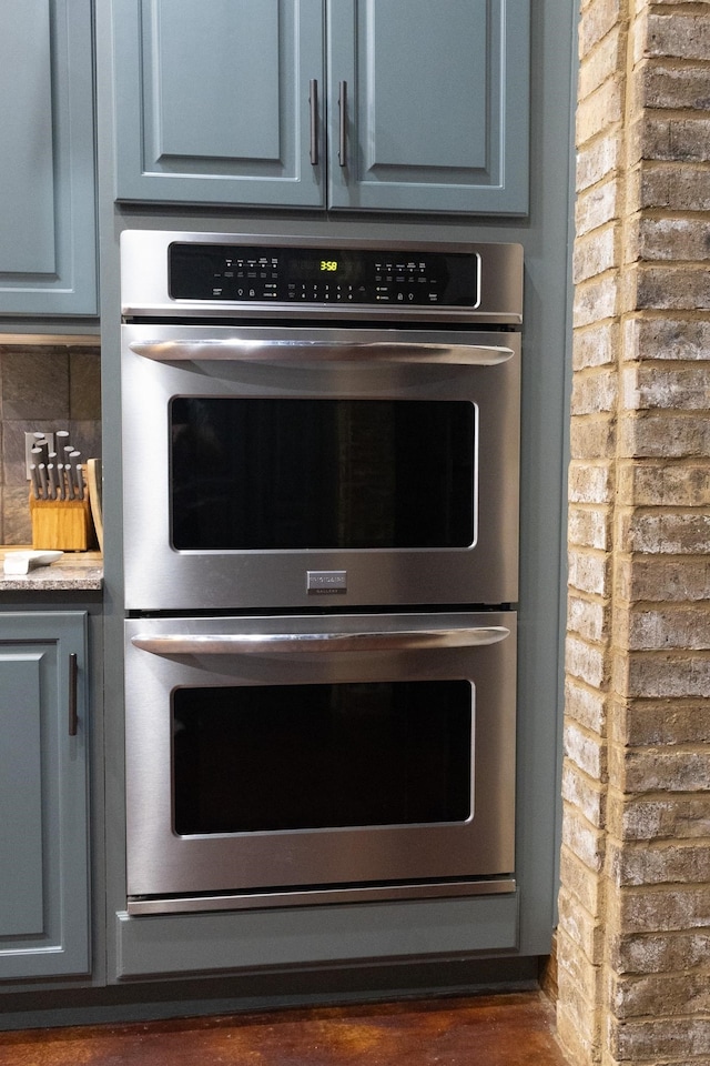4940 Kent Rd, Tremont, MS 38876 - room details featuring decorative backsplash and double oven