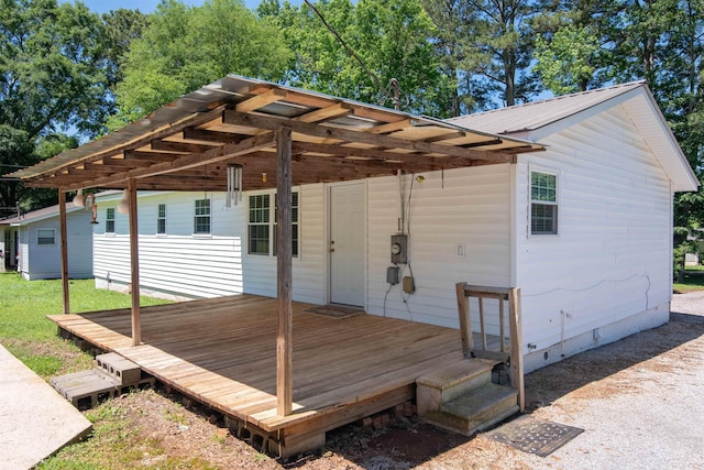  - wooden deck with a carport