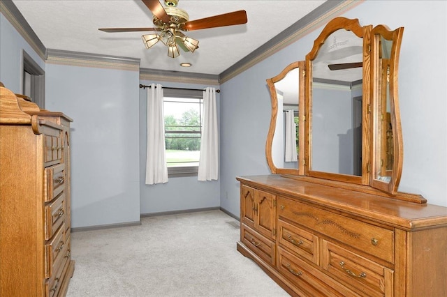 bedroom featuring light colored carpet, ceiling fan, and ornamental molding