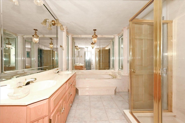 bathroom with vanity, a textured ceiling, independent shower and bath, and tile patterned flooring