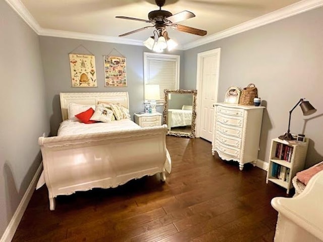 bedroom with crown molding, dark hardwood / wood-style floors, and ceiling fan