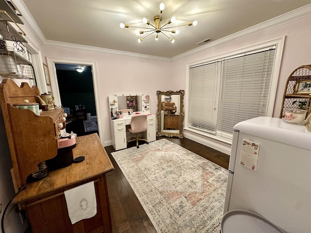 home office featuring dark wood-type flooring, ornamental molding, and a chandelier