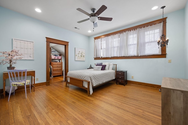 bedroom with light wood-style floors, recessed lighting, visible vents, and baseboards