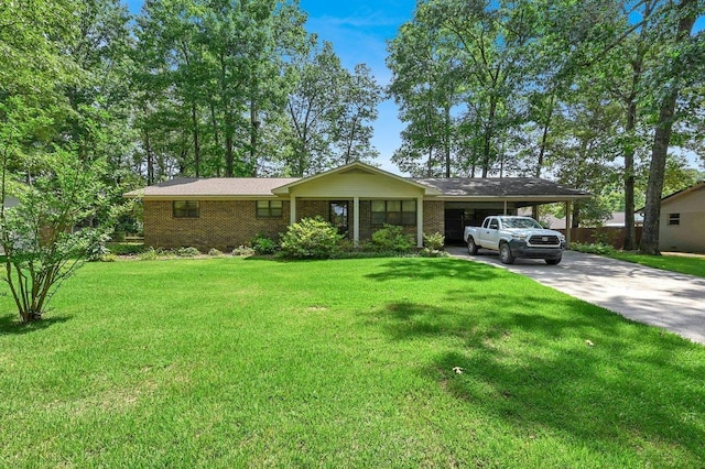 single story home with a front lawn and a carport