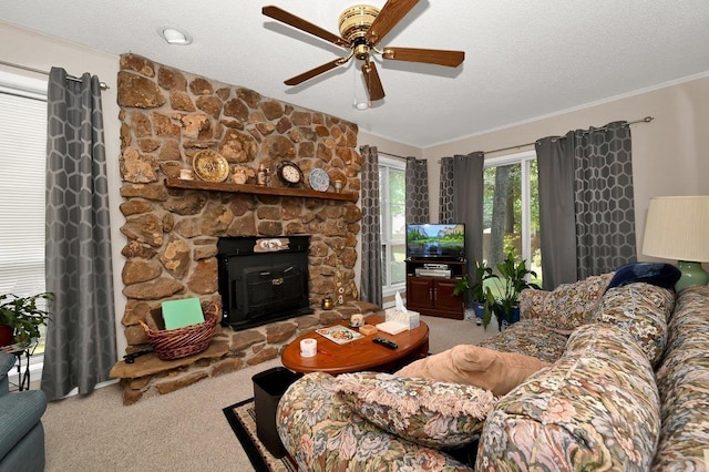 living room featuring carpet, a textured ceiling, and ceiling fan