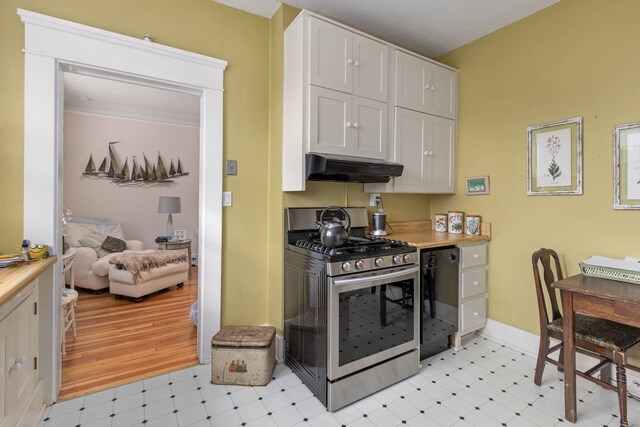  - kitchen with stainless steel gas range oven, under cabinet range hood, light flooring, dishwasher, and light countertops