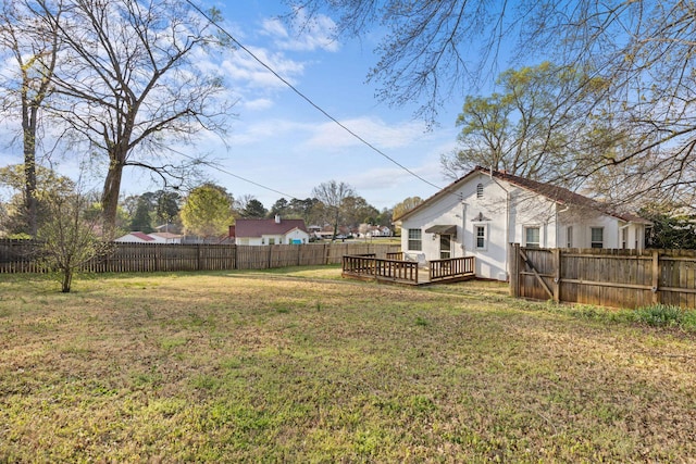  - view of yard featuring a deck