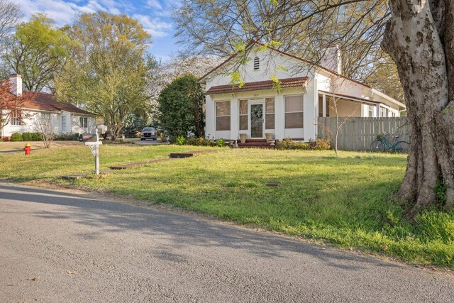  - view of front of home featuring entry steps and stucco siding