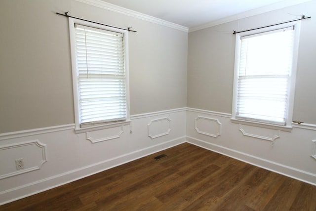 unfurnished room with dark hardwood / wood-style flooring and ornamental molding