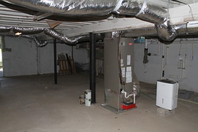 basement featuring heating unit